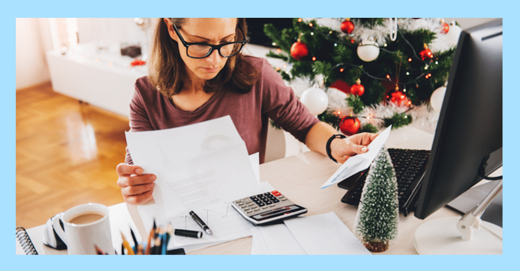 Woman processing payroll for Christmas Holidays