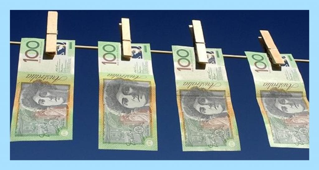 100 dollar notes on washing line